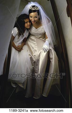 people, Hispanic, wedding, mischievous, bride, flower girl, indoors View Large Photo Image Stock Image - people, Hispanic, wedding, mischievous, bride, flower girl, indoors. Fotosearch