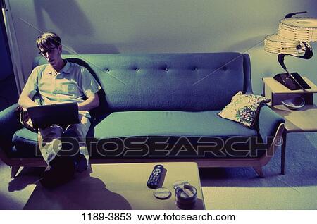 people, home, computer, laptop, couch View Large Photo Image Stock Image - people, home, computer, laptop, couch. Fotosearch