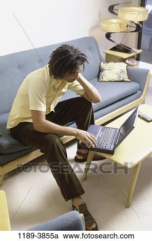 people, home, computer, laptop, indoors View Large Photo Image Stock Image - people, home, computer, laptop, indoors. Fotosearch