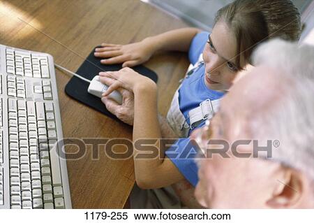 people, home, keyboard, teacher, eyeglasses, mouse, computer View Large Photo Image Stock Photography - people, home, keyboard, teacher, eyeglasses, mouse, computer. Fotosearch