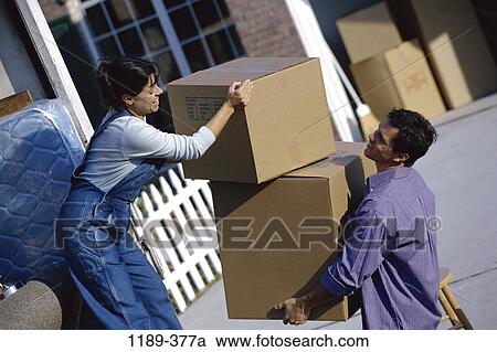 people, home, moving, couple, outdoors, carrying View Large Photo Image Stock Image - people, home, moving, couple, outdoors, carrying. Fotosearch