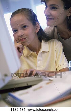 people, home, technology, mother, computer, homework, family View Large Photo Image Stock Photography - people, home, technology, mother, computer, homework, family. Fotosearch