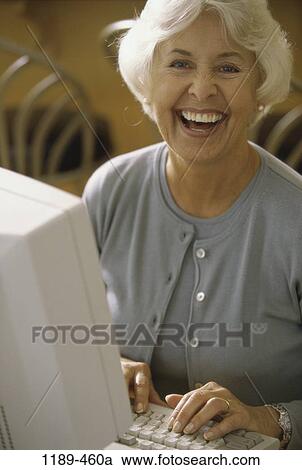 people, home, woman, smiling, technology, senior, computer View Large Photo Image Stock Image - people, home, woman, smiling, technology, senior, computer. Fotosearch