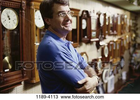 people, industry, business, timepieces, Middle-aged, wall View Large Photo Image Stock Image - people, industry, business, timepieces, Middle-aged, wall. Fotosearch