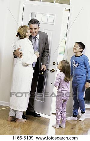 people, morning, briefcase, suit, hugging, family, embracing View Large Photo Image Stock Photo - people, morning, briefcase, suit, hugging, family, embracing. Fotosearch