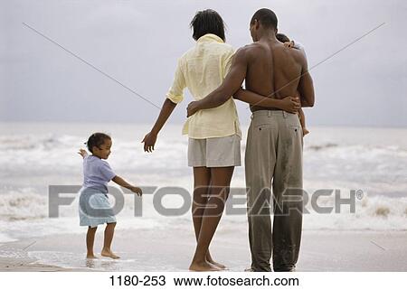 people, mother, beach, tranquility, commitment, family, vacation View Large Photo Image Stock Image - people, mother, beach, tranquility, commitment, family, vacation. Fotosearch