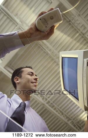 Stock Image - people, mouse, computer, business, view, brunette. Fotosearch