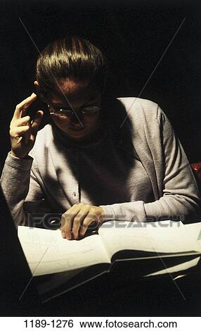 people, night, concentration, reading, book, studying, concentrating View Large Photo Image Stock Photograph - people, night, concentration, reading, book, studying, concentrating. Fotosearch