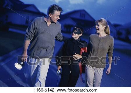 people, night, walking, mask, houses, costume, street View Large Photo Image Stock Image - people, night, walking, mask, houses, costume, street. Fotosearch