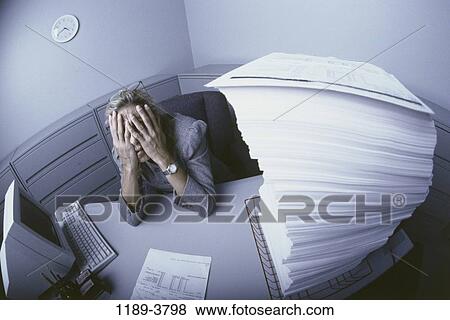 people, paper, desk, woman, paperwork, depression View Large Photo Image Stock Photo - people, paper, desk, woman, paperwork, depression. Fotosearch