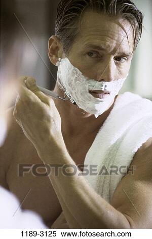 Stock Photography - people, reflection, mirror, Middle-aged, towel, bath. Fotosearch