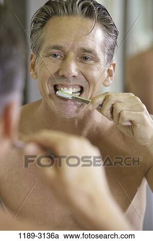 people, reflection, teeth, brushing, cleaning, mirror View Large Photo Image Stock Image - people, reflection, teeth, brushing, cleaning, mirror. Fotosearch