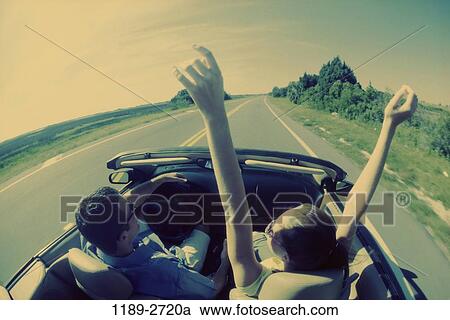 people, road, couple, car, driving, convertible View Large Photo Image Stock Image - people, road, couple, car, driving, convertible. Fotosearch