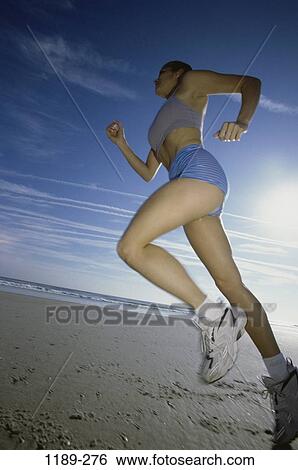 people, running, woman, healthy, beach, jogging, energetic View Large Photo Image Stock Photograph - people, running, woman, healthy, beach, jogging, energetic. Fotosearch