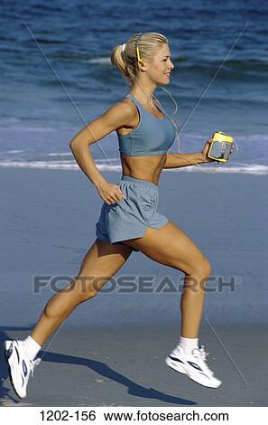 people, running, woman, listening, beach, jogging, exercise View Large Photo Image Stock Photograph - people, running, woman, listening, beach, jogging, exercise. Fotosearch