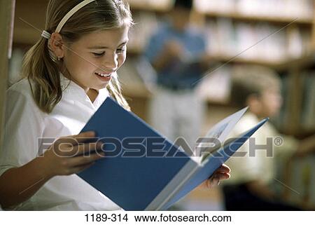 people, school, reading, book, library, girl, concentrating View Large Photo Image Picture - people, school, reading, book, library, girl, concentrating. Fotosearch