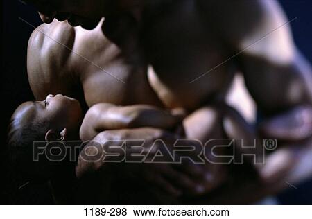 people, sleeping, baby, holding, family, admiring View Large Photo Image Stock Photo - people, sleeping, baby, holding, family, admiring. Fotosearch