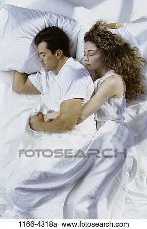 people, sleeping, couple, Hispanic, bed, pillows, asleep View Large Photo Image Stock Image - people, sleeping, couple, Hispanic, bed, pillows, asleep. Fotosearch