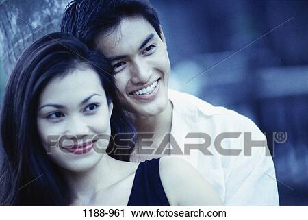 people, smiling, Asian, couple, holding, leaning, outdoors View Large Photo Image Stock Image - people, smiling, Asian, couple, holding, leaning, outdoors. Fotosearch