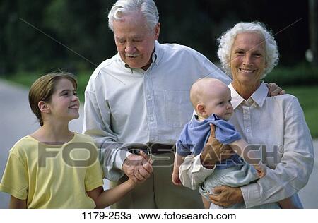 people, smiling, baby, happy, outdoors, park, hugging View Large Photo Image Stock Image - people, smiling, baby, happy, outdoors, park, hugging. Fotosearch