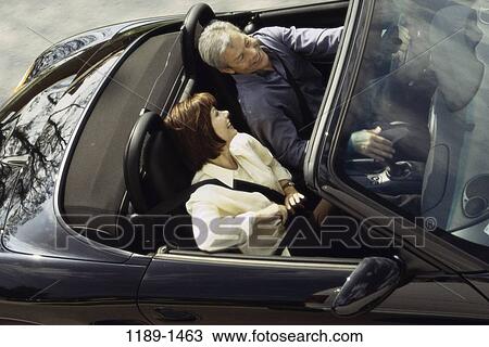 people, smiling, couple, car, driving, convertible View Large Photo Image Stock Image - people, smiling, couple, car, driving, convertible. Fotosearch
