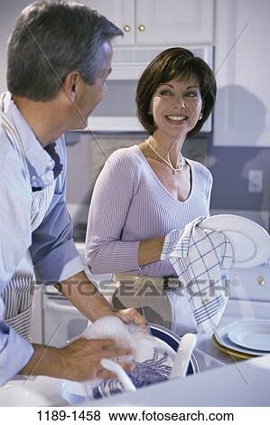 people, smiling, couple, cleaning, Middle-aged, teamwork, smile View Large Photo Image Stock Photo - people, smiling, couple, cleaning, Middle-aged, teamwork, smile. Fotosearch
