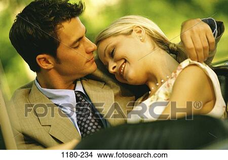 Picture - people, smiling, couple, outdoors, romantic, tranquility, Middle-aged. Fotosearch