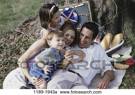 people, smiling, picnic, bread, laughing, outdoors View Large Photo Image Stock Image - people, smiling, picnic, bread, laughing, outdoors. Fotosearch