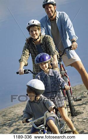 people, smiling, riding, outdoors, sports, bicycles, outings View Large Photo Image Stock Photograph - people, smiling, riding, outdoors, sports, bicycles, outings. Fotosearch