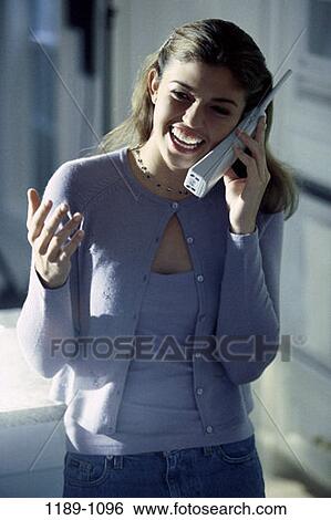 people, smiling, telephone, talking, excitement, excited, phone View Large Photo Image Stock Photograph - people, smiling, telephone, talking, excitement, excited, phone. Fotosearch