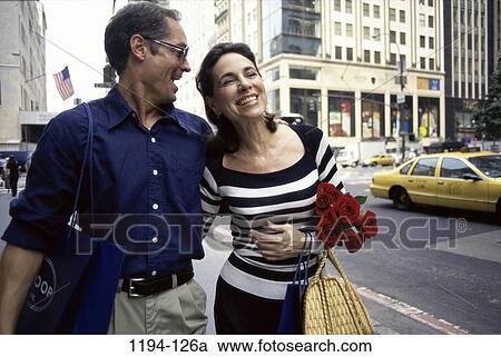 people, smiling, urban, walking, couple, city View Large Photo Image Stock Image - people, smiling, urban, walking, couple, city. Fotosearch