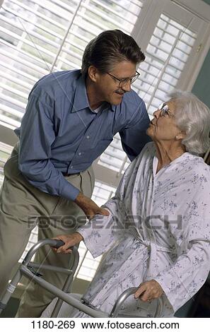 people, smiling, walking, eyeglasses, window, mother, holding View Large Photo Image Stock Photo - people, smiling, walking, eyeglasses, window, mother, holding. Fotosearch