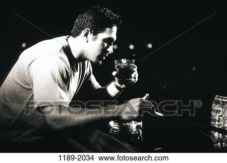people, smoke, cigarette, drinking, bar, alcohol View Large Photo Image Picture - people, smoke, cigarette, drinking, bar, alcohol. Fotosearch