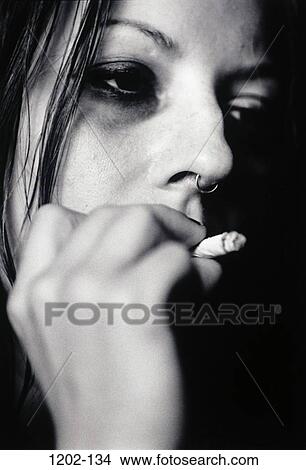 people, smoke, smoking, piercing, vice, drug View Large Photo Image Picture - people, smoke, smoking, piercing, vice, drug. Fotosearch