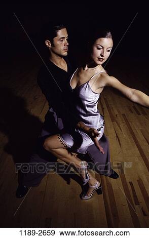 people, staring, couple, Hispanic, dancing, nightlife, gazing View Large Photo Image Stock Photo - people, staring, couple, Hispanic, dancing, nightlife, gazing. Fotosearch