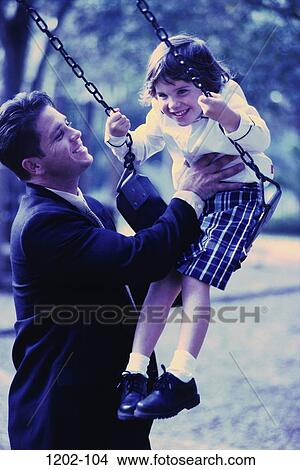 people, swing, playground, commitment, father, daughter, happiness View Large Photo Image Picture - people, swing, playground, commitment, father, daughter, happiness. Fotosearch
