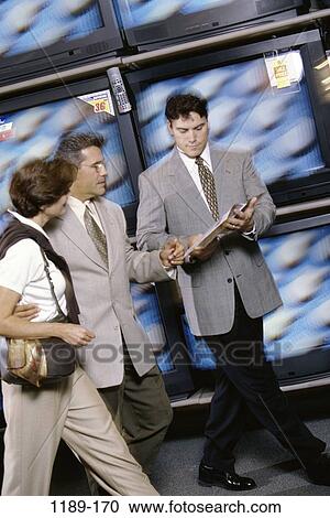 people, walking, couple, motion, Middle-aged, shopping, convincing View Large Photo Image Stock Image - people, walking, couple, motion, Middle-aged, shopping, convincing. Fotosearch