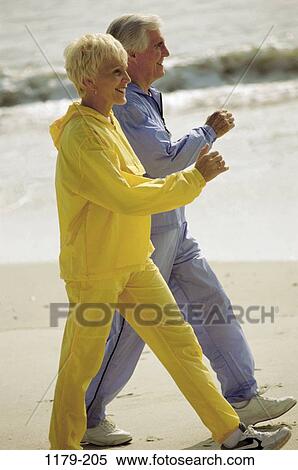 people, walking, couple, senior, healthy, beach, health View Large Photo Image Stock Photography - people, walking, couple, senior, healthy, beach, health. Fotosearch