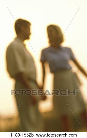 people, walking, talking, couple, silhouette, outdoors, romantic View Large Photo Image Stock Image - people, walking, talking, couple, silhouette, outdoors, romantic. Fotosearch