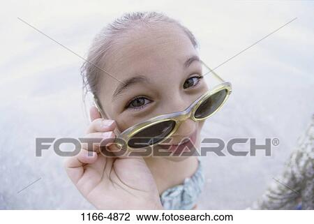 people, water, beach, sunglasses, girl, child View Large Photo Image Stock Image - people, water, beach, sunglasses, girl, child. Fotosearch
