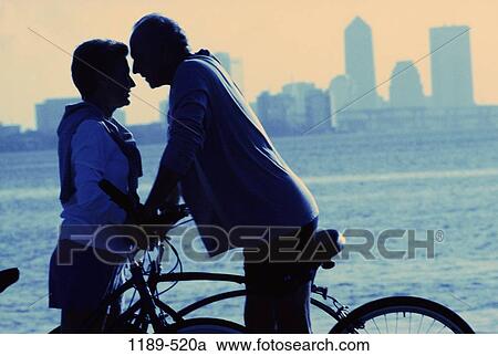 people, water, buildings, talking, couple, senior View Large Photo Image Stock Image - people, water, buildings, talking, couple, senior. Fotosearch