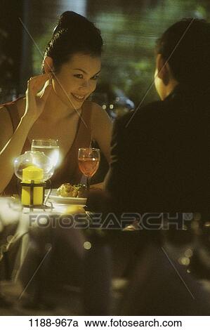 people, water, glasses, talking, Asian, couple, conversation View Large Photo Image Stock Image - people, water, glasses, talking, Asian, couple, conversation. Fotosearch