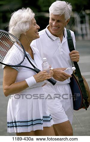 people, water, playing, walking, talking, couple, senior View Large Photo Image Stock Image - people, water, playing, walking, talking, couple, senior. Fotosearch