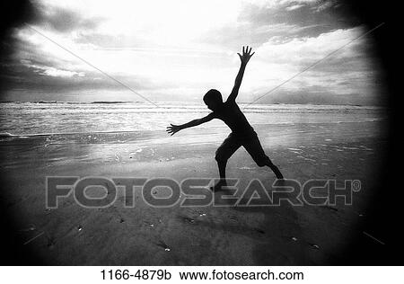 people, water, running, beach, silhouette, boy View Large Photo Image Stock Image - people, water, running, beach, silhouette, boy. Fotosearch