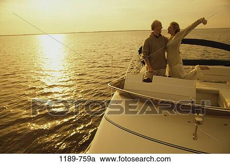 Stock Image - people, water, sea, couple, ocean, excited. Fotosearch