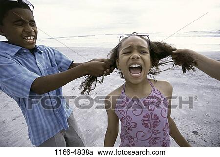 people, water, smiling, beach, laughing, sunglasses View Large Photo Image Stock Image - people, water, smiling, beach, laughing, sunglasses. Fotosearch