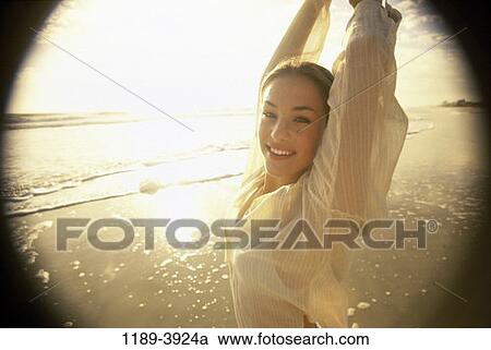 people, water, woman, smiling, staring, sunlight View Large Photo Image Stock Image - people, water, woman, smiling, staring, sunlight. Fotosearch
