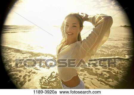 people, woman, beach, clothed, Caucasian, young adult View Large Photo Image Stock Image - people, woman, beach, clothed, Caucasian, young adult. Fotosearch