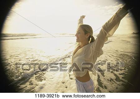 people, woman, beach, clothed, young adult, Young women beach clothed View Large Photo Image Stock Image - people, woman, beach, clothed, young adult, Young women beach clothed. Fotosearch