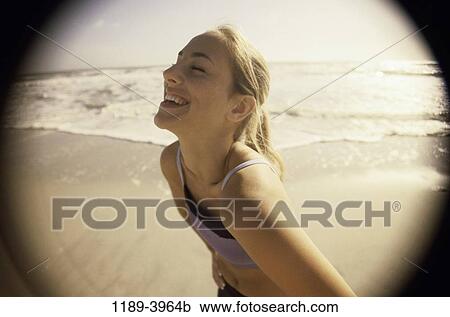 people, woman, beach, young adult, Young women beach standing View Large Photo Image Stock Image - people, woman, beach, young adult, Young women beach standing. Fotosearch